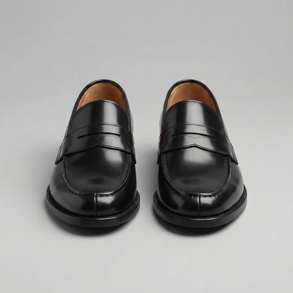 Men's black penny loafers with round toes and low block heels