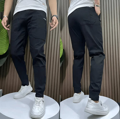 Unisex tapered cargo trousers with front, side and rear pockets