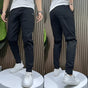 Unisex tapered cargo trousers with front, side and rear pockets