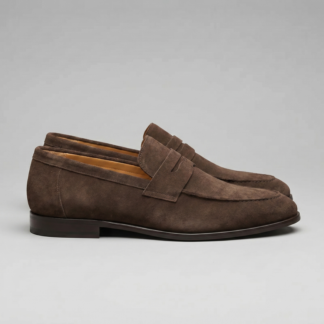 Men's penny loafers with rounded toes, strap detail and flat soles