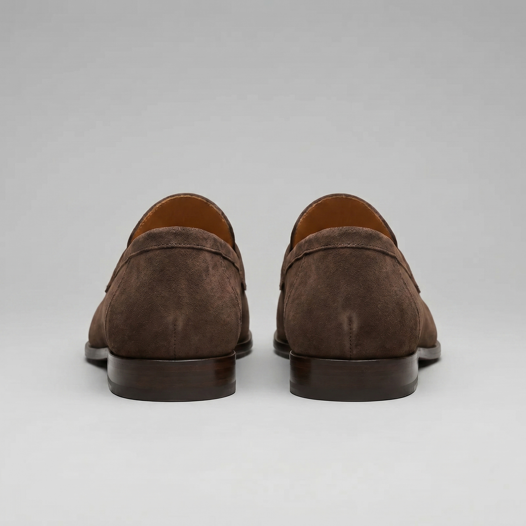 Men's penny loafers with rounded toes, strap detail and flat soles