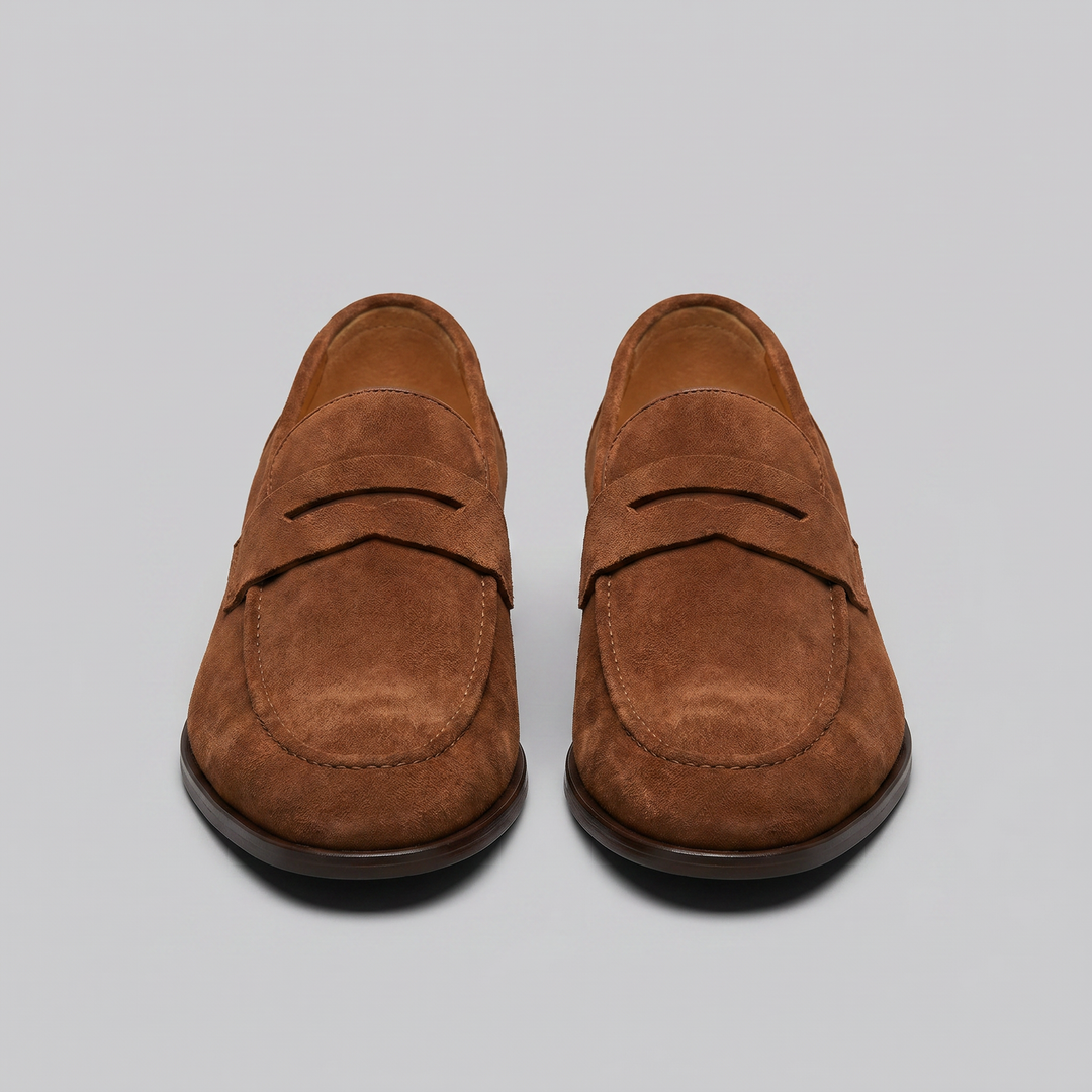 Men's penny loafers with rounded toes, strap detail and flat soles