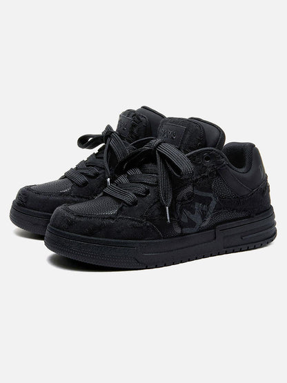 Black high-top sneakers with laces, camouflage side detail and rubber soles