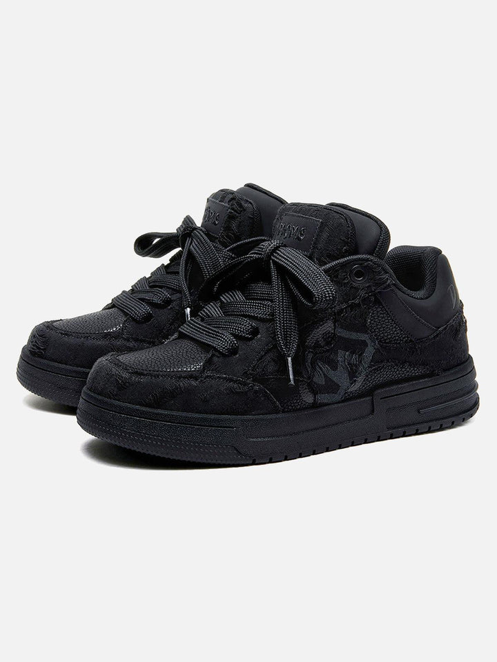 Black high-top sneakers with laces, camouflage side detail and rubber soles