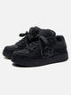 Black high-top sneakers with laces, camouflage side detail and rubber soles