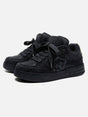 Black high-top sneakers with laces, camouflage side detail and rubber soles