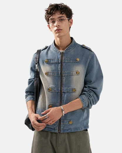 Napoleon-style washed denim jacket with mandarin collar and buttoned front tabs