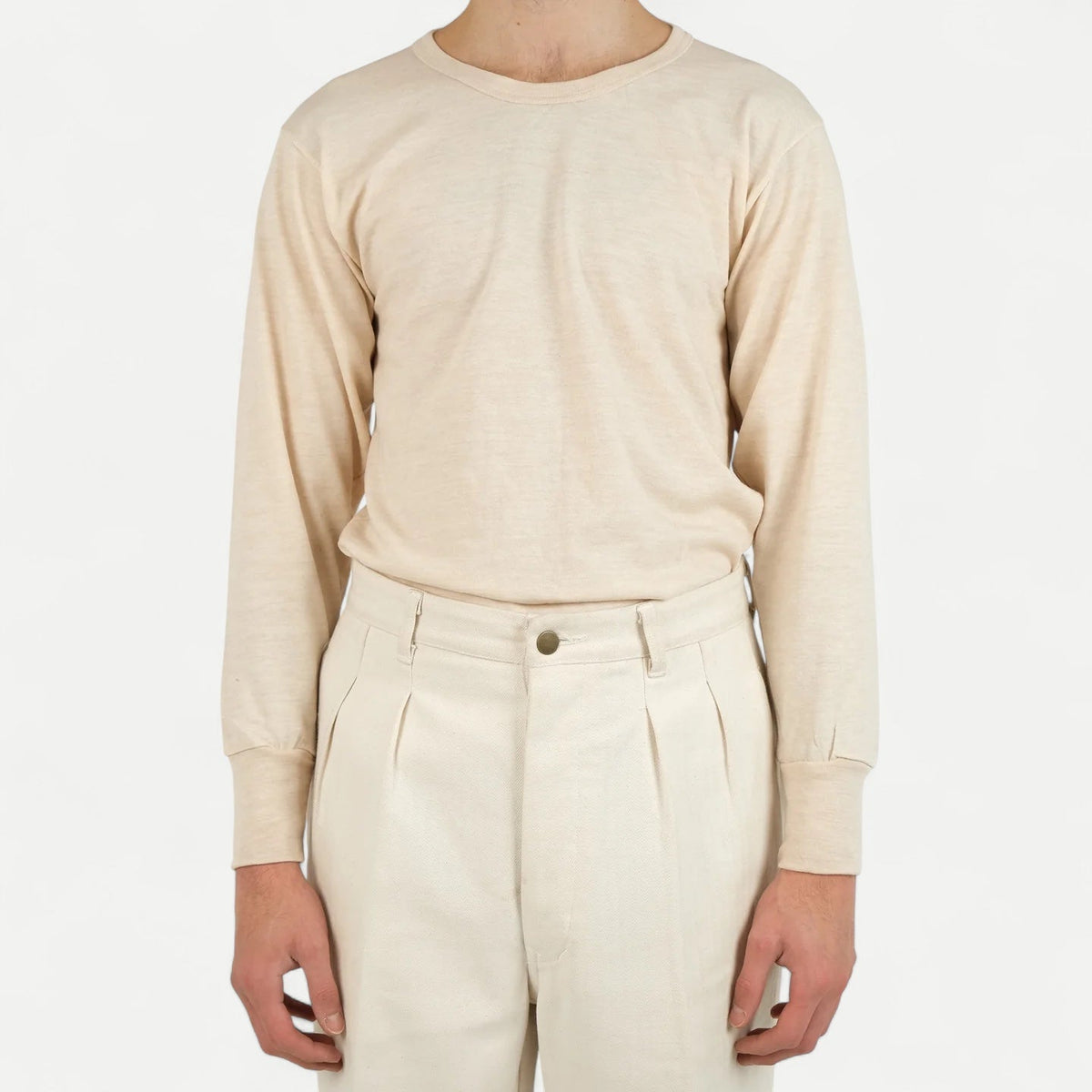 Men's beige long-sleeve crew-neck top with ribbed cuffs