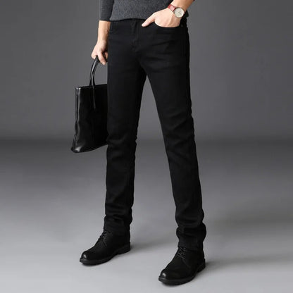 Men's slim straight-leg denim jeans with five-pocket design and belt loops