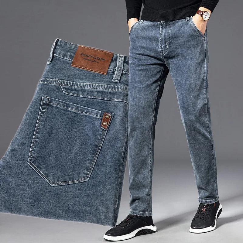 Men's slim straight-leg denim jeans with five-pocket design and belt loops
