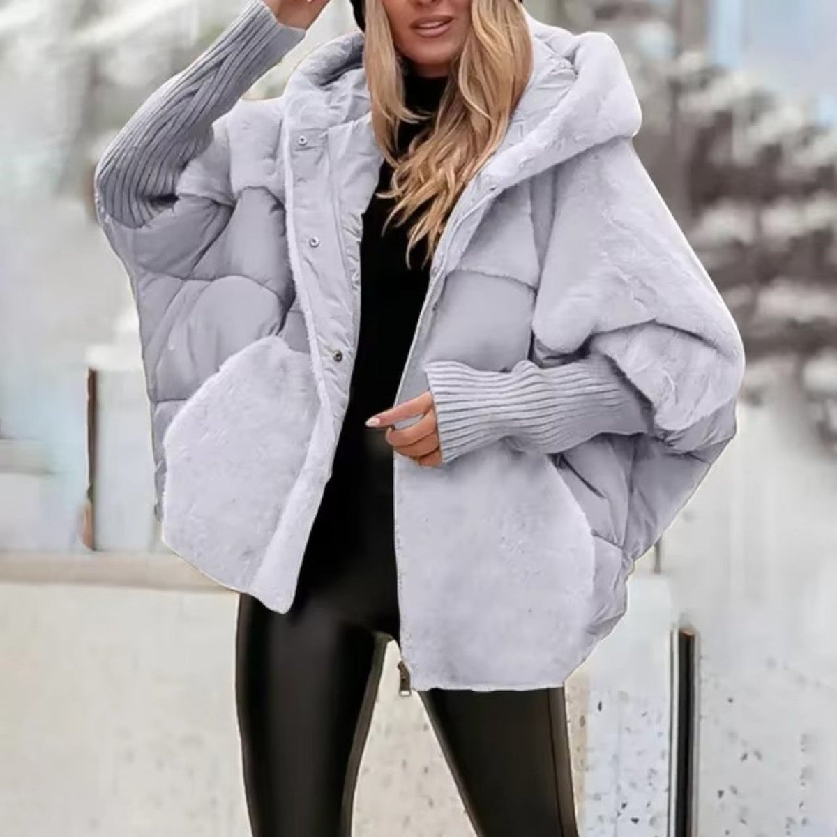 Women's oversized hooded quilted jacket with ribbed cuffs